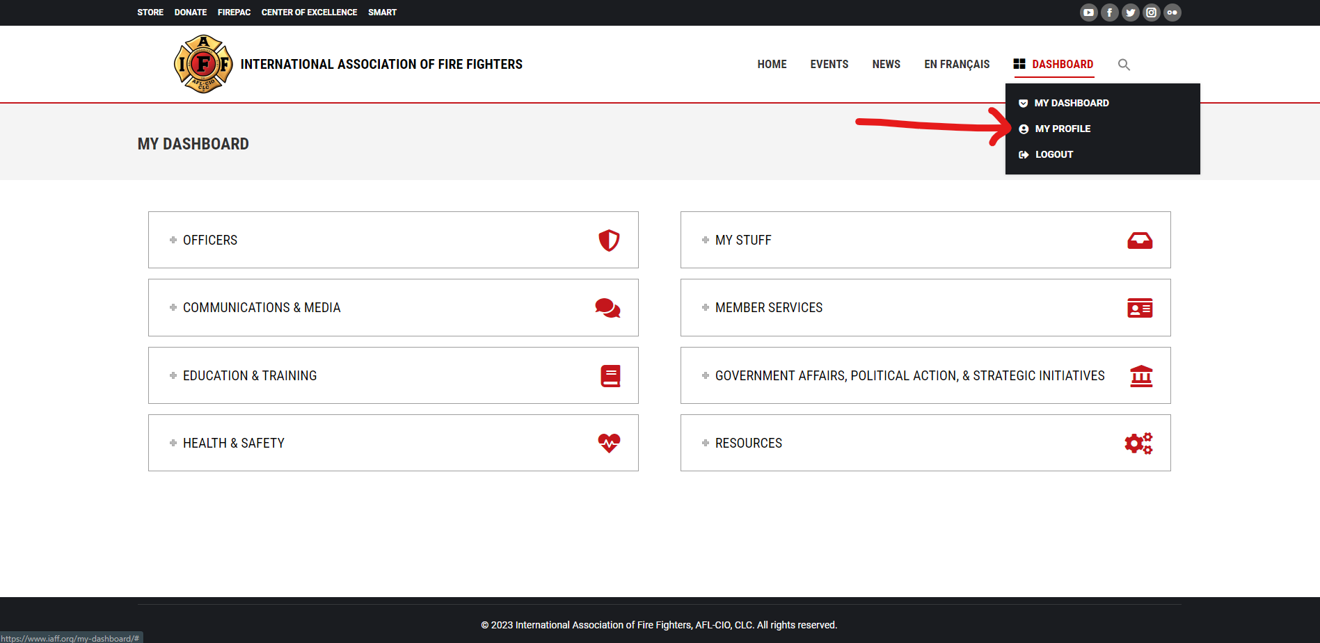 Screenshot of IAFF dashboard loading page with a red arrow pointing to the "My profile," option under the dashboard drop down.